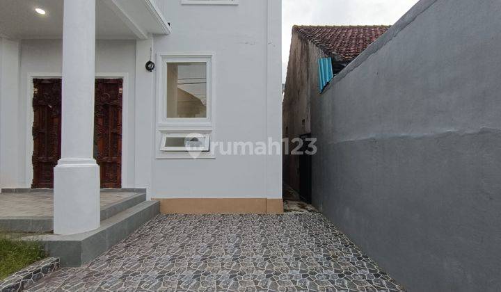 DISEWAKAN RUMAH 2 LANTAI TERAWAT DI RENON DENPASAR  2