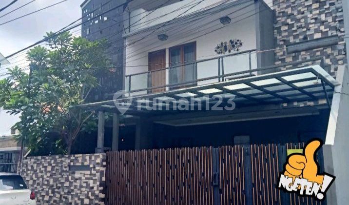 For Sale 3-Story Minimalist House in Tebet, Two-Car Street, With Swimming Pool 1