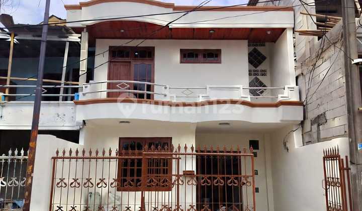 Rumah Siap Huni di Thb, Tata Ruang Fungsional & Fasilitas Lengkap (22211 Er) 1