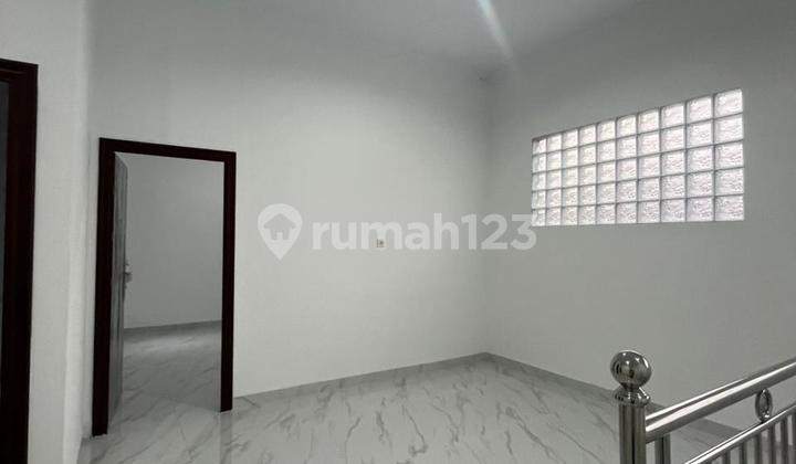 Rumah Baru Premium 2 Lantai di Harapan Indah (13694 MAR) 2