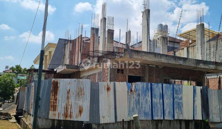 Dijual Kavling Dengan Bangunan Setengah Jadi di Puri Kencana  1