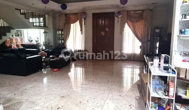 House with Many Carports, Already SHM, Can't Miss It in Puri Indah, Negotiable Until Deal!