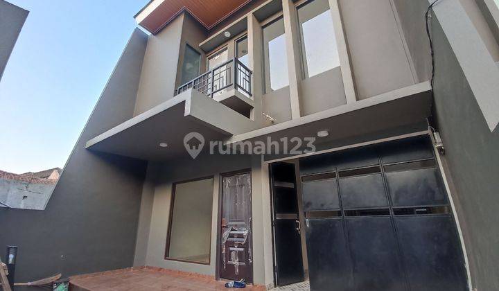 Wen Kirman - Rumah Sunrise Garden Murah 1