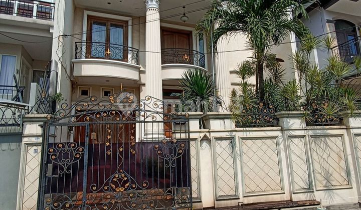 Wen Kirman - Rumah Mewah Sunrise Garden Semifurnish