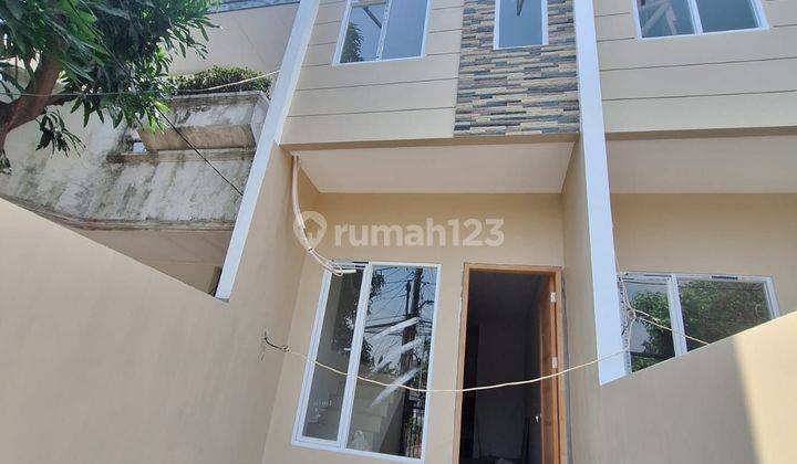 Wilson Rumah baru free ac 2 unit atau kitchen set di duri kepa 1