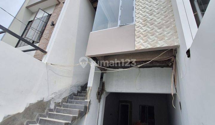 Wilson Rumah lokasi bagus hadap timur di duri kepa 2
