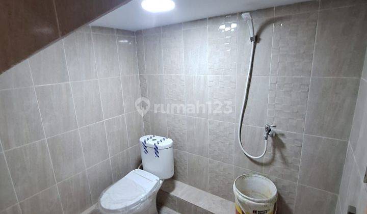 Wilson Rumah 2 lantai uk 7x12 di poris indah 2