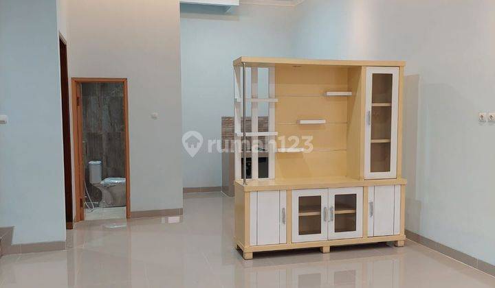 Wilson Rumah baru lokasi bagus 2 lantai di poris indah 2