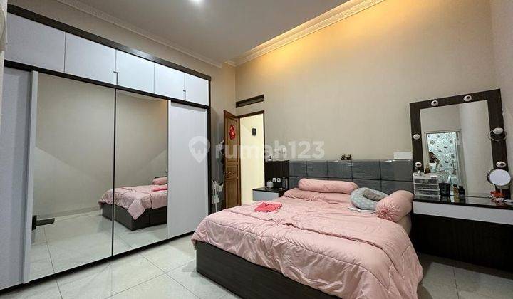 Wilson Rumah furnished uk 4.5x15 jalan 3 mobil di poris indah 1