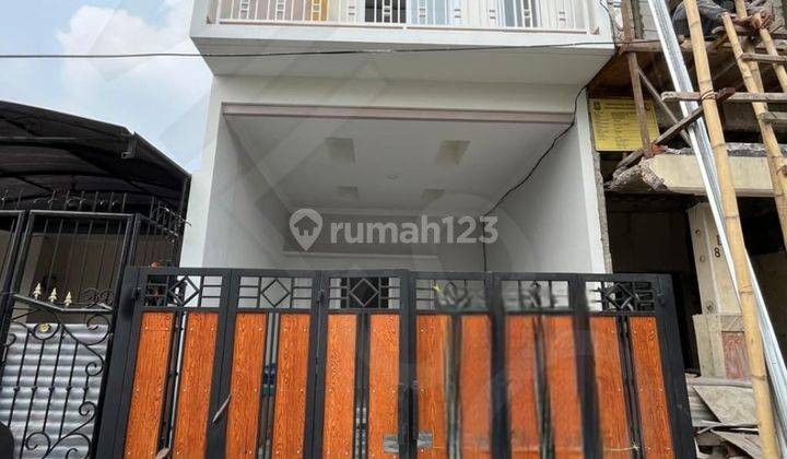 Wilson Rumah Minimalis Row Jalan Besar di Poris Indah 1