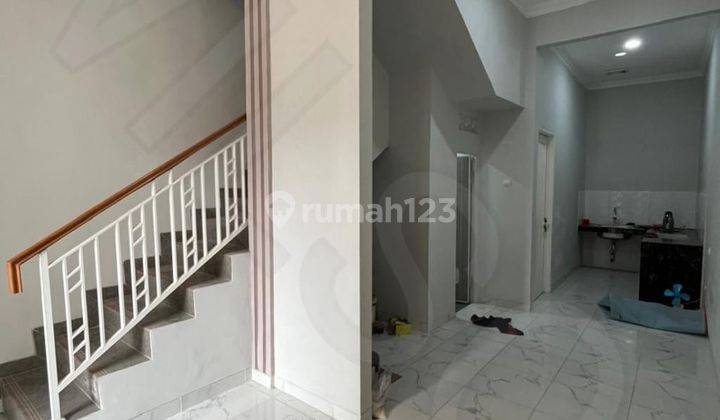 Wilson Rumah Minimalis Row Jalan Besar di Poris Indah 2