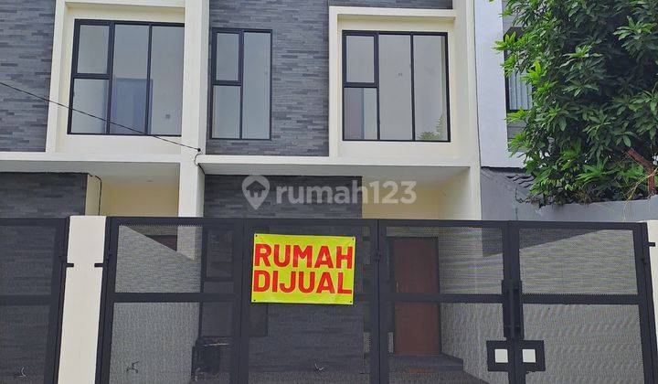 Wilson Rumah bebas banjir di meruya kav dki 1