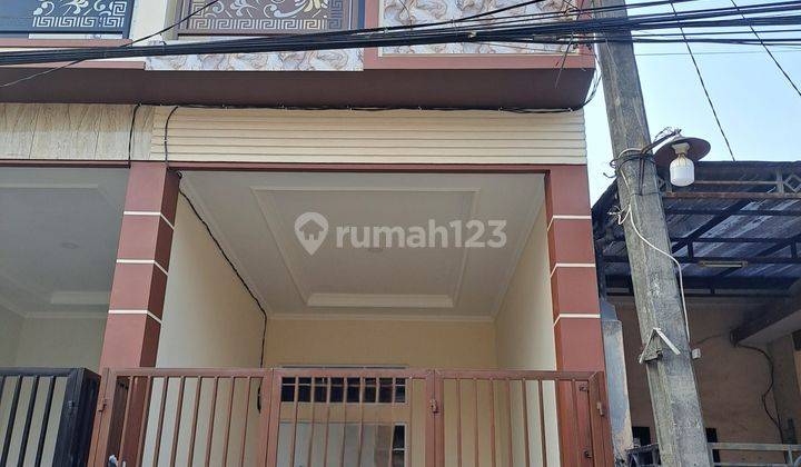 Wilson Rumah baru row jalan 3 mobil bisa usaha di poris indah 1