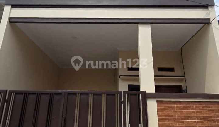 Wilson Rumah Baru Hadap Timur di Poris Indah