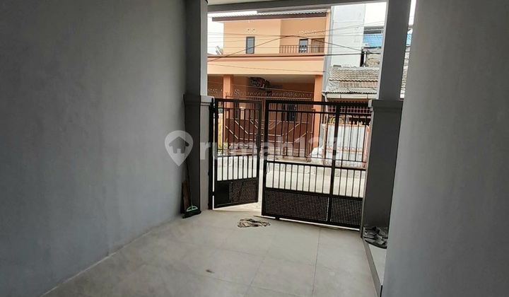 Wilson Brand New Rumah Poris Indah Bebas Banjir