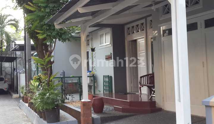 Ready-to-Occupy House in a Lush Environment within the Bintaro Residential Area 2