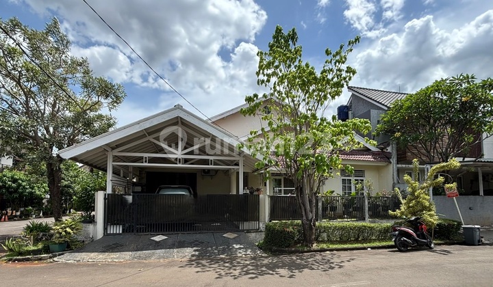 A house in a serene, comfortable, and exclusive One Gate System environment in Bintaro Jaya.