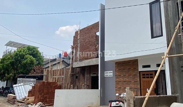 RUMAH MINIMALIS TOWNHOUSE 2 LANTAI BARU DI CISARANTEN ARCAMANIK 2