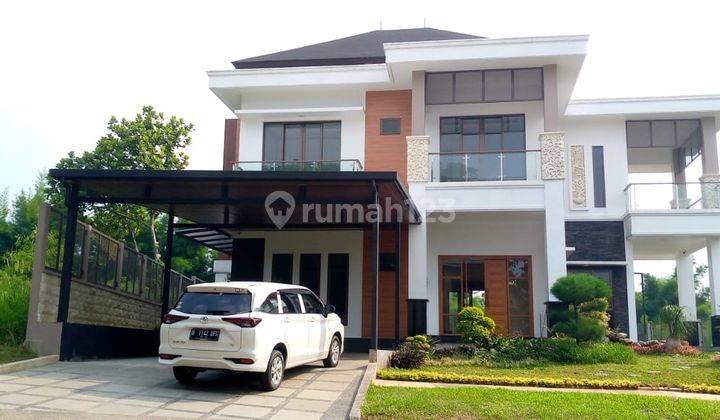 Rumah Minimalis 2lt Dengan Kolam Ikan Dan Taman Luas  1