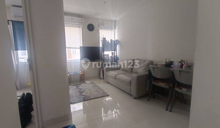 Apartemen 1 kamar furnish view kolam renang dekat exit tol 2