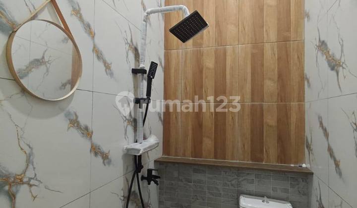 3KT Spacious House Eligible for Mortgage with Low Down Payment Fully Renovated in Graha Persada Sentosa, Bekasi City 2