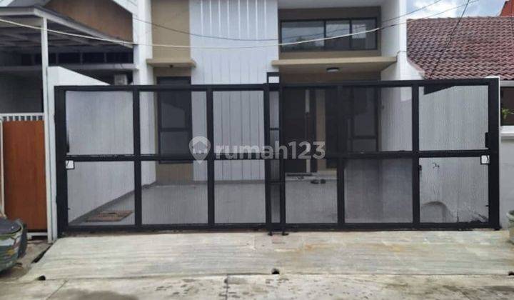 Rumah Tinggal Finishing di Taman Harapan Baru Dekat Jalan Raya 1