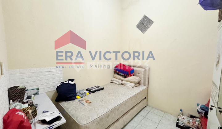 Rumah Asri Strategis Dekat Hwa Ind & Pasar Blimbing, Akses Mudah Jalan Poros