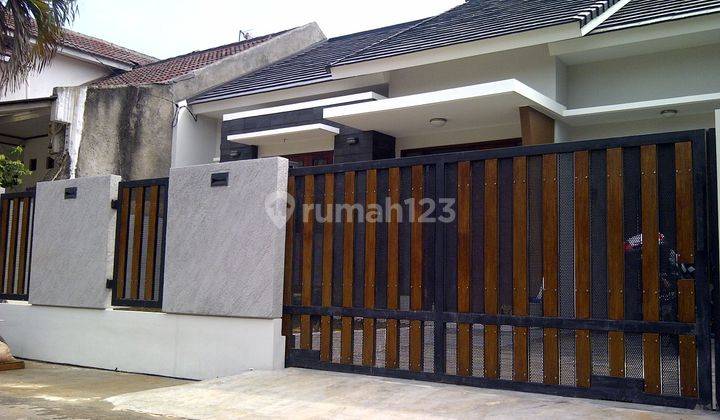 Rumah 1.5 lantai asri ada halaman depan dan belakang 1