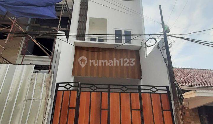 Rumah Baru Indent lokasi strategis di Tomang(TM100) 1