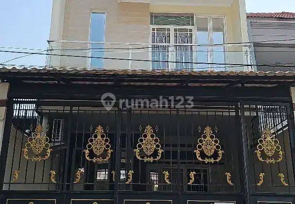 Rumah 113meter mewah bagus di jelambar(JL298) 1