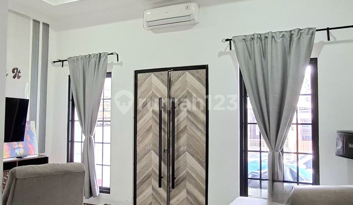 Minimalist 2-Storey House in the Bintaro Adjacent Housing Complex