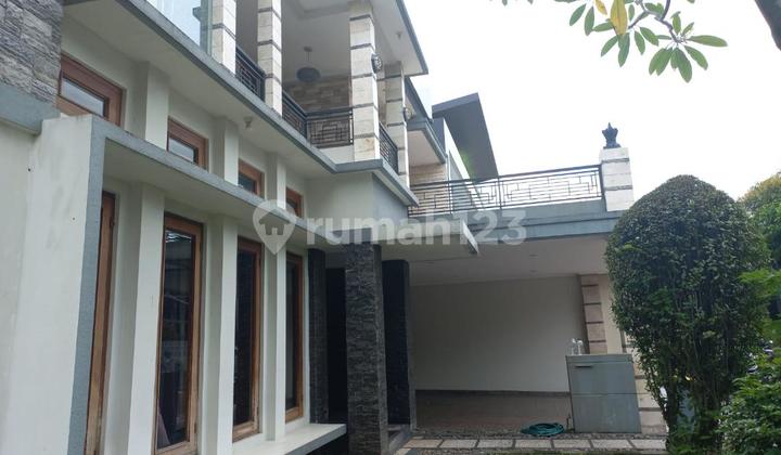 For Sale: Beautiful Move-In Ready Corner House with Swimming Pool in a Quiet, Clean, and Green Environment at Menteng Residence Bintaro.