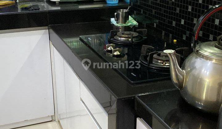 Dijual Rumah Luas 90m2 Furnished di Cluster Europe, Green Lake City 2