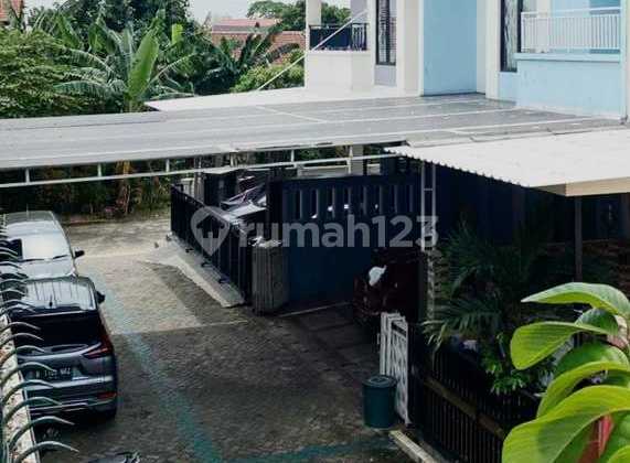 Dijual cepat Rumah di Komplek Palem Semi full furnish 2 lantai lokasi strategis
