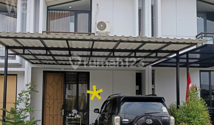 For Sale: Waterfront Cikarang House - 2 Floors, Strategic Location, Move-In Ready!