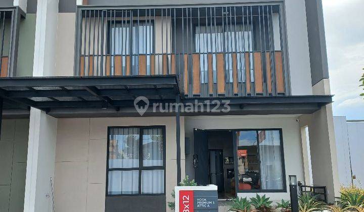 Rumah Modern Minimalis Dengan Atap Attic di Cluster Strozzi 1