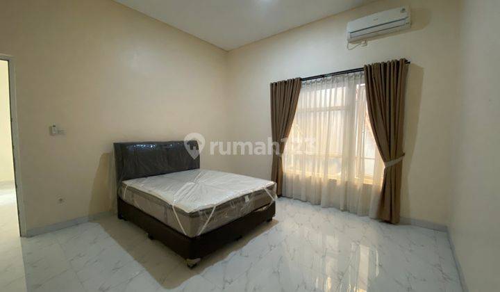 Rumah Bagus Brand New 2 lantai Semi Furnished di Mandala Tomang 8
