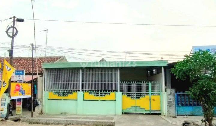 Rumah Di Pinggir Jalan Raya Strategis 1