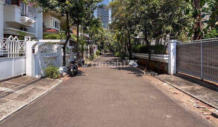 Rumah Terawat di Kuningan Shm, Garasi Carport, 35M Nego 2