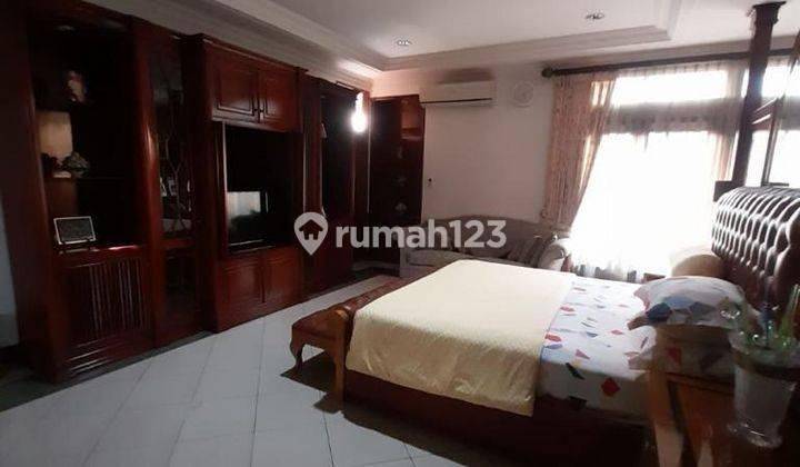 Rumah Cozy Plus Kolam Renang Luas Raffles Hills Cibubur 2