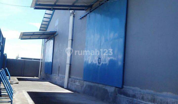 Gudang 2 unit gandeng dengan tanah parkiran 1000 m2 di Parangloe 2