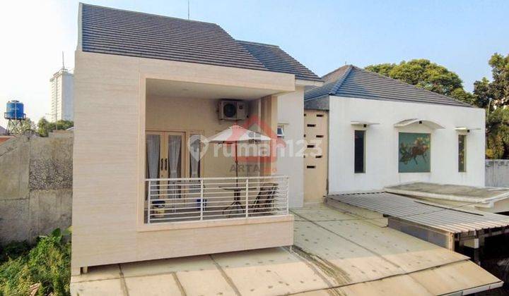 Town house minimalis, siap huni, lok oke 1