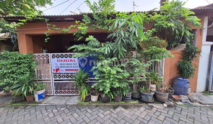 Rumah di Jl.Komodo II Perumnas 1 2 Lantai SHM 1