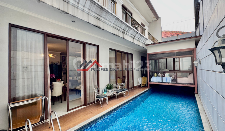 Rumah Desain Tropikal Modern dengan Kolam Renang di Cipete, Jakarta Selatan 1