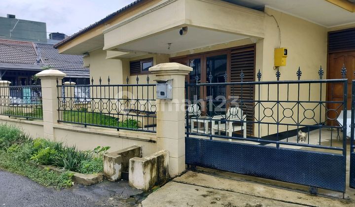 House Located Near Public Facilities and Flood Embankment 2