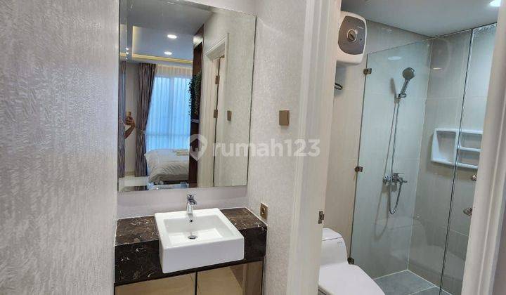 DIJUAL CEPAT..HARGA MURAH..!!! 2 + 1 BEDROOMS FULLY FURNISHED INTERIOR LANTAI TENGAH LUAS 62m² @ GRAND MADISON, JAKARTA BARAT 2