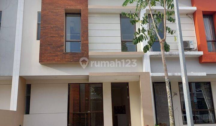 Rumah minimalis siap huni di graha raya 1