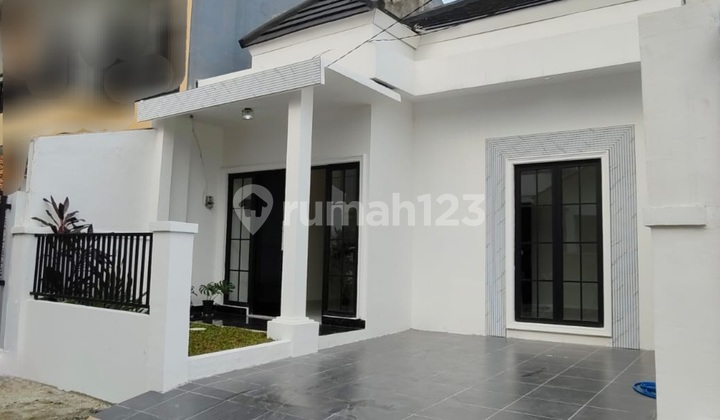 Rumah 1 1/4 Lantai Di Bsd Griya Loka
