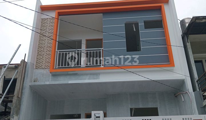 Jual.rumah baru taman ratu murah lokasi bagus tidak banjir 1