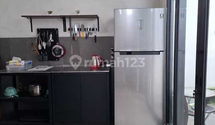 rumah nyaman minimalis di taman kopo indah 2 1